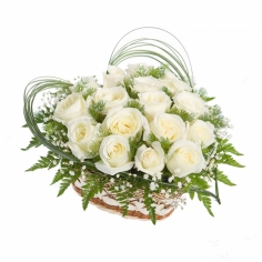 White roses and green fillers arranged in a heart-shaped basket