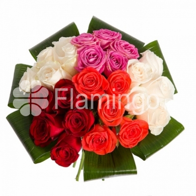 An originally composed round bouquet of roses of several colors