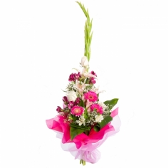 White and pink gladiolus, roses, parrot flowers and gerbera daisies