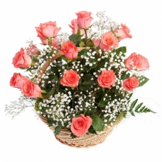 Pink roses arranged in a basket with green fillers