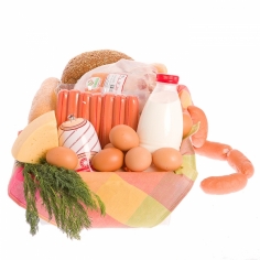 A basket with fresh bread, eggs, milk, chicken and sausages