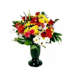 A bouquet of red roses and carnations, white and yellow chrysanthemums with green fillers