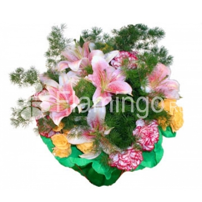 Lilies, roses and carnations nicely wrapped with green fillers