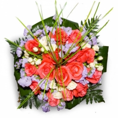 A round bouquet of roses with statice and green fillers