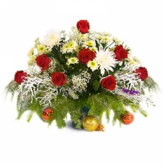 A basket arrangement of red roses, yellow chrysanthemums and pine branches