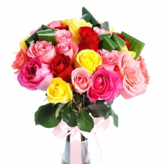 Roses of different colors arranged with aspidistra leaves