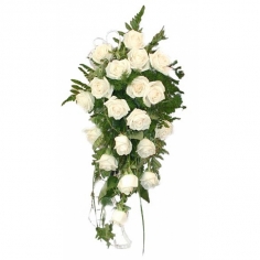 White roses gracefully arranged with green fillers