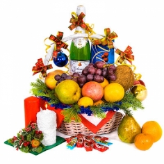 A Christmas-styled basket with champagne, fruit and chocolates 