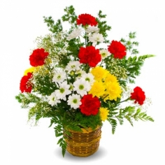 A basket with chrysanthemums, carnations and green fillers