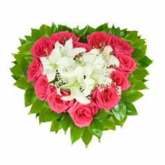 A heart-shaped composition of white roses, pink lilies and green fillers