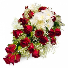A bouquet of red roses and white spray chrysanthemums with baby breath