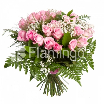 Light pink roses arranged with baby breath and green fillers