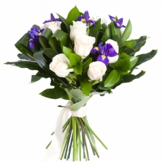 A bouquet of white roses, blue irises and green fillers tied with a bow 