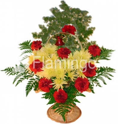 A basket with red carnations and yellow spray chrysanthemums