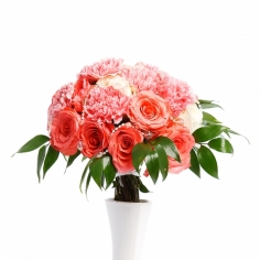 Pink and white roses and pink carnations in a round bouquet with green fillers