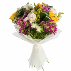 A bouquet of roses, chrysanthemums and parrot flowers of different colors