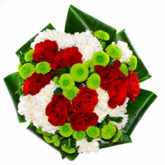 A eurobouquet of vinous roses, white carns and green chrysanthemums