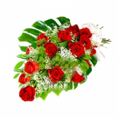A bouquet of red roses with green fillers and baby breath