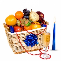 A decorated fruit basket and a bottle of sparkling wine