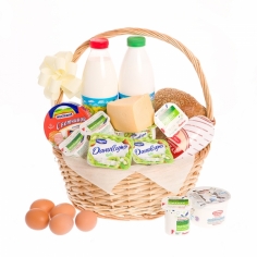 A basket of milk and other products for breakfast
