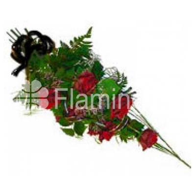 A funeral bouquet of roses and green fillers tied with a black bow